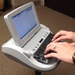 Court reporting stenography machine similar to machines used by court reporters at Urlaub Bowen & Associates in Chicago, IL.