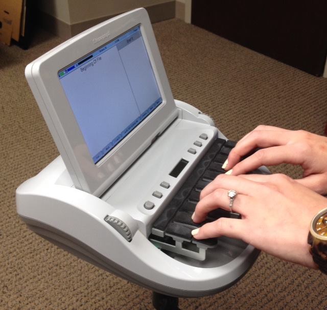 Court reporting stenography machine similar to machines used by court reporters at Urlaub Bowen & Associates in Chicago, IL.